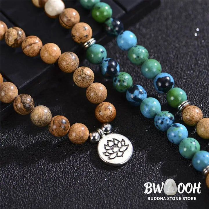 BWOOOH 108-bead meditation mala crafted from natural bodhi seed and speckled picture jasper, featuring a delicate lotus symbol pendant, worn as a multilayer bracelet or necklace. - View 3