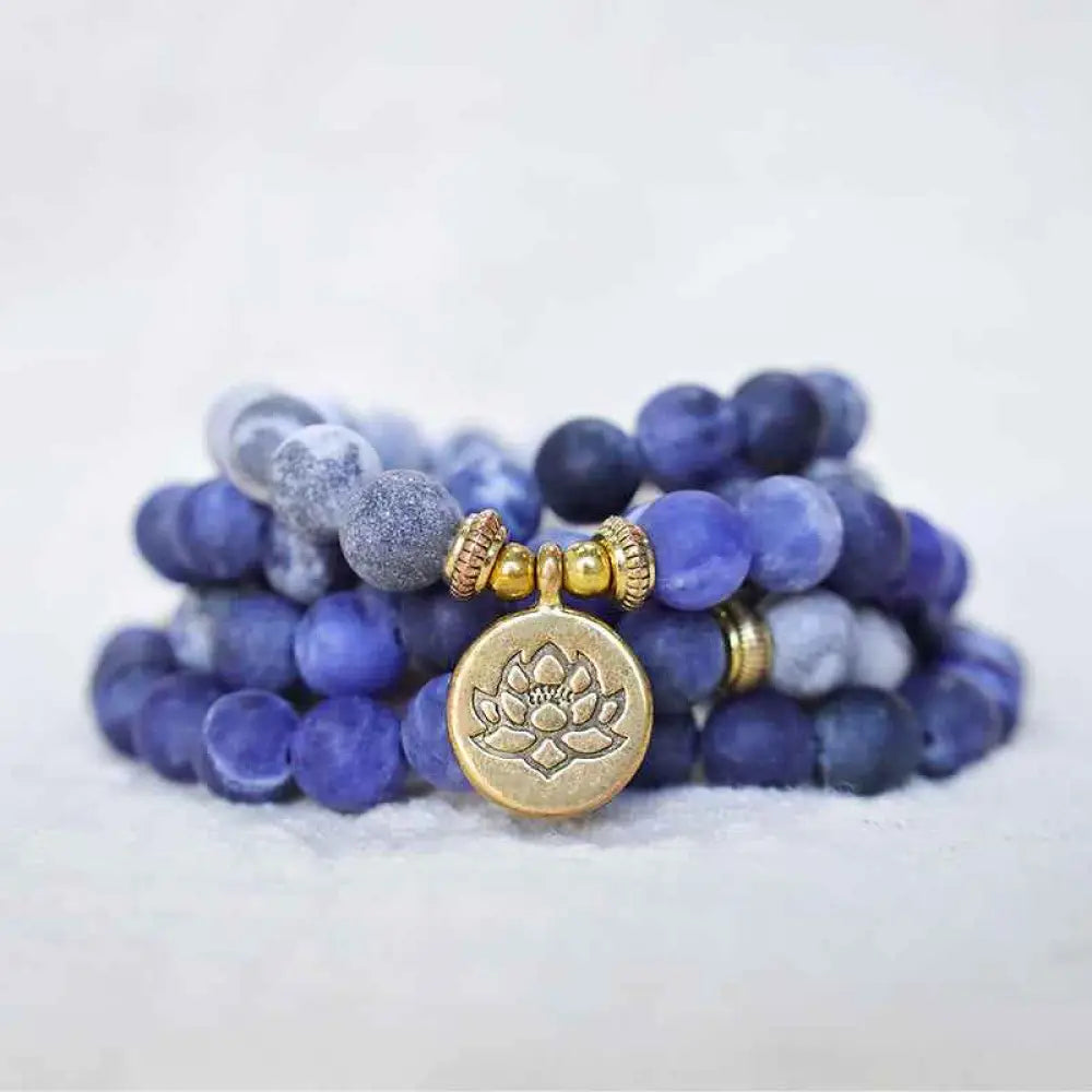 BWOOOH 108 Picasso Jasper & Blue Stone Mala Bead bracelet with lotus pendant. Unisex, 6mm beads for meditation, focus, and energizing spiritual balance.