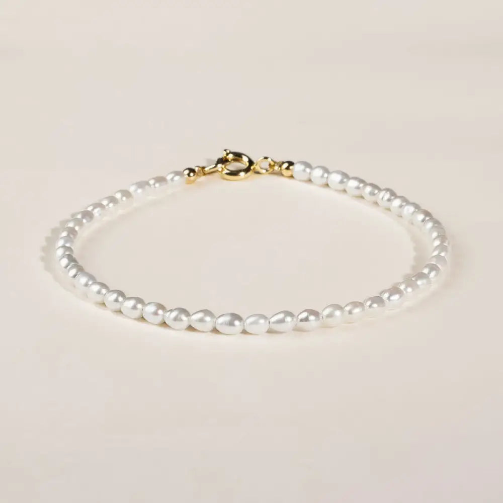 BWOOOH 2mm natural pearl wisdom bracelet with 14k gold accents.