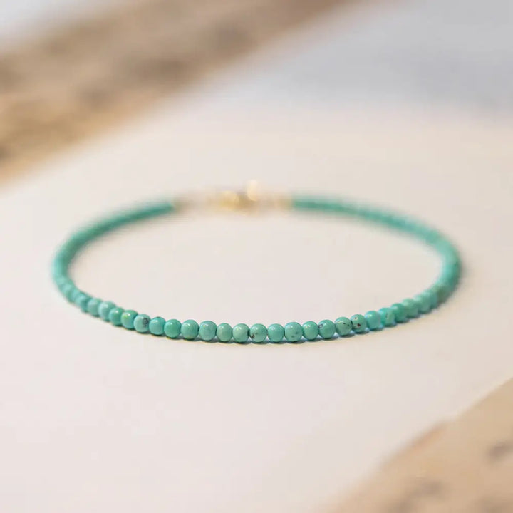 BWOOOH 2mm turquoise beads ultra-thin wisdom bracelet.