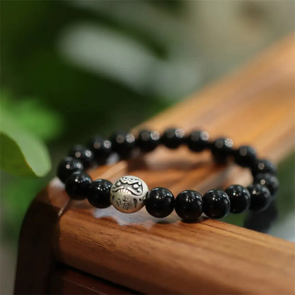 BWOOOH 925 Sterling Silver Black Onyx Bead Character Engraved Protection Bracelet featuring Drolma-inspired design elements for meditation and mindfulness.