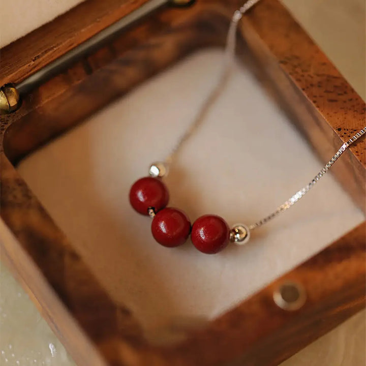 BWOOOH 925 Sterling Silver Cinnabar Bead Calm Blessing Necklace Pendant — deep red cinnabar in silver setting