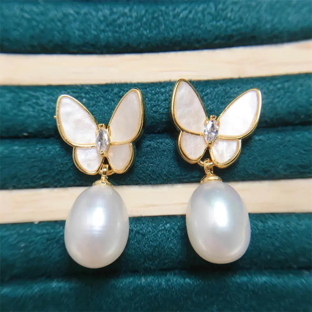 BWOOOH 925 Sterling Silver Posts 18K Gold Plated Copper Pearl Butterfly Optimism Stud Earrings — Sterling Silver spiritual...