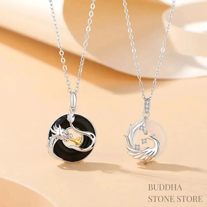 A BWOOOH 925 Sterling Silver Dragon Phoenix Peace Buckle necklace pendant featuring a polished natural Black Onyx and subtle Chalcedony inlay, symbolizing protection, inner peace, and harmonious balance. Ideal for Year of the Dragon alignment.