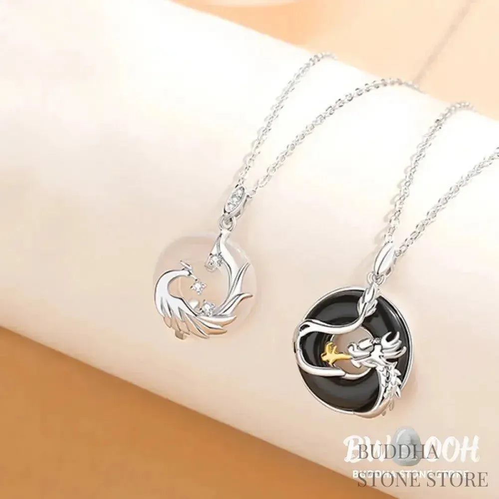 A BWOOOH 925 Sterling Silver Dragon Phoenix Peace Buckle necklace pendant featuring a polished natural Black Onyx and subtle Chalcedony inlay, symbolizing protection, inner peace, and harmonious balance. Ideal for Year of the Dragon alignment. - View 8