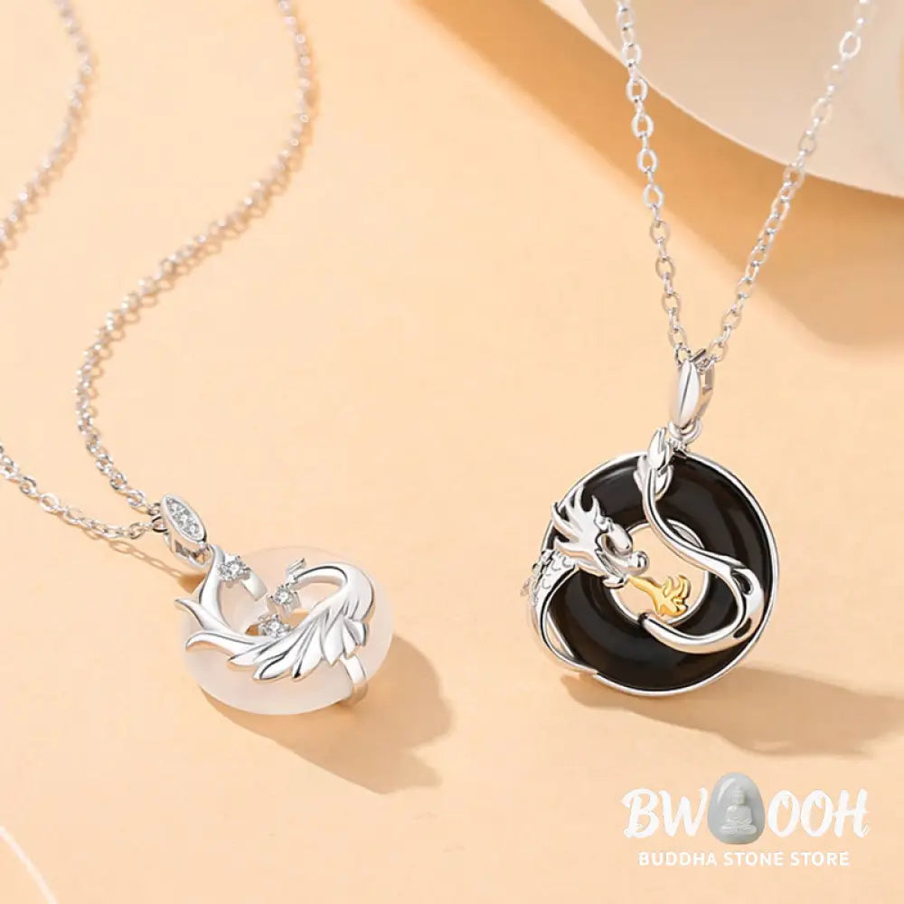 A BWOOOH 925 Sterling Silver Dragon Phoenix Peace Buckle necklace pendant featuring a polished natural Black Onyx and subtle Chalcedony inlay, symbolizing protection, inner peace, and harmonious balance. Ideal for Year of the Dragon alignment. - View 7
