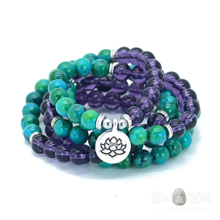 A BWOOOH Amethyst and Green Aventurine spiritual bracelet featuring a delicate silver-tone Lotus charm, handcrafted on an elastic string, showcasing vibrant purple and soothing green natural crystal beads for inner peace, stress relief, and emotional balance. - View 4