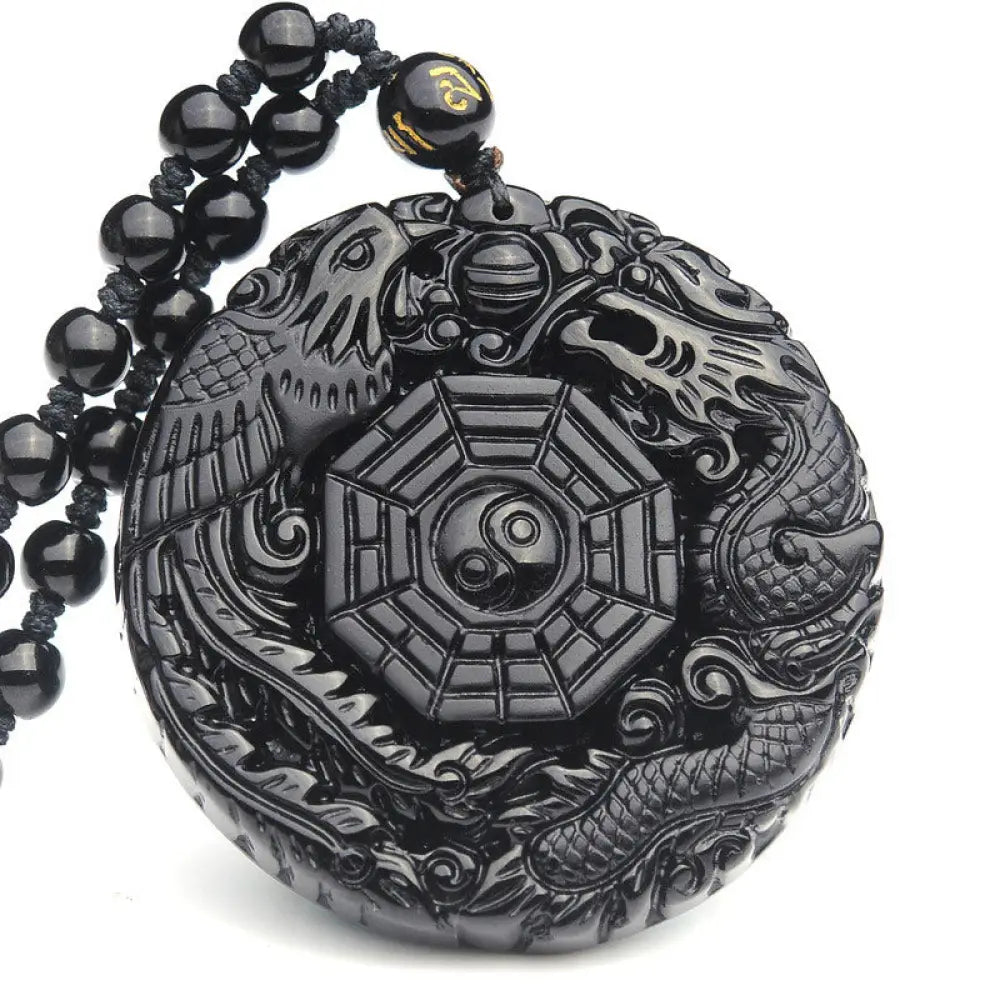 BWOOOH Bagua Dragon Phoenix Obsidian Fulfilment Pendant Necklace, featuring a 50x50x10mm carved black obsidian pendant with intricate Bagua, dragon, and phoenix symbols, suspended on an adjustable unisex cord.