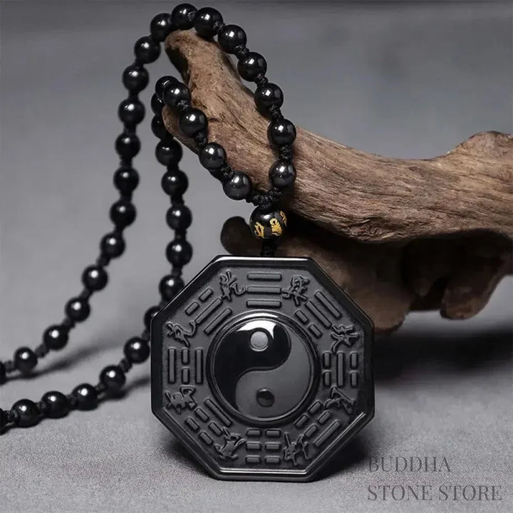 BWOOOH Black Obsidian Yin Yang Pendant Necklace (48x48mm). Natural carved obsidian on silver chain, symbolizing balance, harmony, and energetic protection.