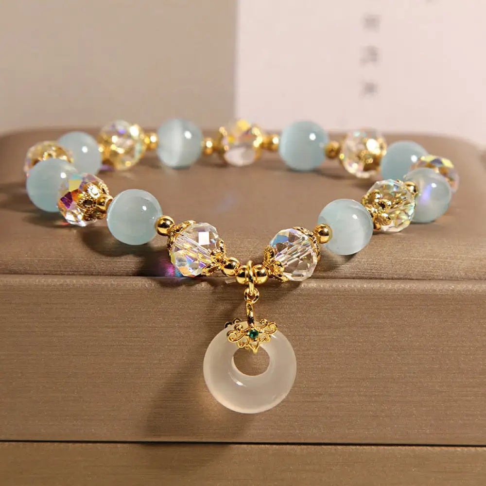 Buddha Stones Blue Cat’s Eye White Crystal Peace Buckle Meaning Balance Bracelet - Blue Cat’s Eye(Wrist Circumference: