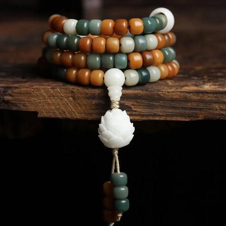 BWOOOH Bodhi Lotus Mala Harmony Necklace &amp; Bracelet, 108 Bodhi Seed and Jade beads (7x9mm), featuring the lotus symbol. Designed for deep meditation and spiritual balance.