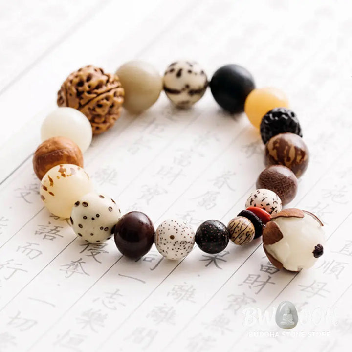 Handcrafted BWOOOH Bodhi Seed Lotus Wisdom Peace Wrist Mala Bracelet, featuring 18 naturally varied bodhi seeds and a delicately engraved lotus symbol, embodying enlightenment, calm, and renewed spiritual focus. - View 13