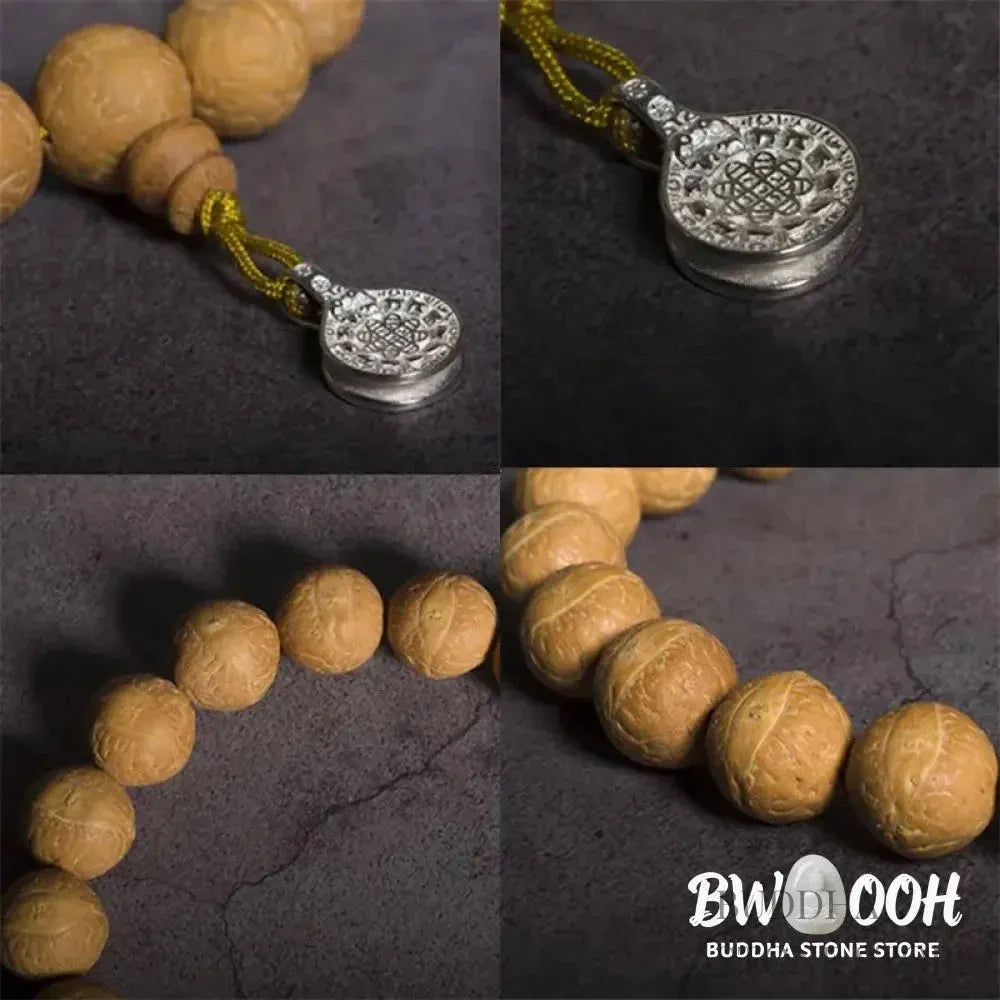 Close-up of BWOOOH Bodhi Seed Wrist Mala featuring dark-speckled 13mm/15mm bodhi seeds on premium elastic string, with a delicate tassel, worn as a meditation accessory or carried as a pocket mala. Unisex. - View 9