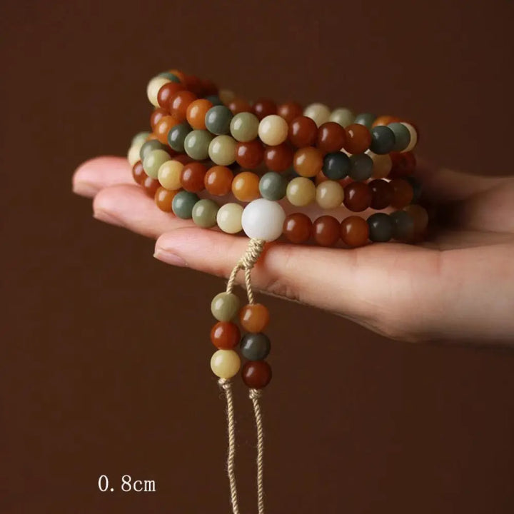 Close-up of BWOOOH Bodhi Seed Mala Harmony Wisdom Bracelet, featuring 8mm dark-speckled bodhi seed beads for meditation and spiritual awakening, handmade and ethically sourced, unisex design.