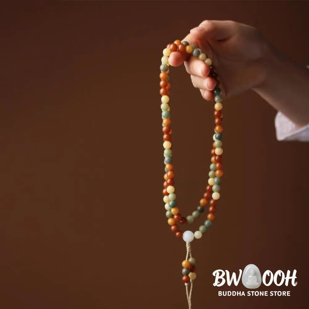 Close-up of BWOOOH Bodhi Seed Mala Harmony Wisdom Bracelet, featuring 8mm dark-speckled bodhi seed beads for meditation and spiritual awakening, handmade and ethically sourced, unisex design. - View 3