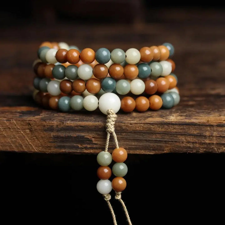Close-up of BWOOOH Bodhi Seed Mala Harmony Wisdom Bracelet, featuring 8mm dark-speckled bodhi seed beads for meditation and spiritual awakening, handmade and ethically sourced, unisex design. - View 6
