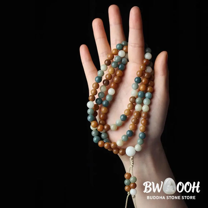 Close-up of BWOOOH Bodhi Seed Mala Harmony Wisdom Bracelet, featuring 8mm dark-speckled bodhi seed beads for meditation and spiritual awakening, handmade and ethically sourced, unisex design. - View 8