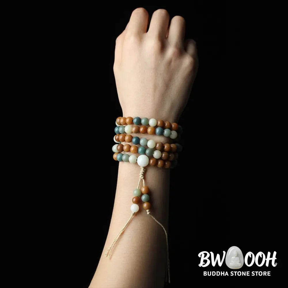 Close-up of BWOOOH Bodhi Seed Mala Harmony Wisdom Bracelet, featuring 8mm dark-speckled bodhi seed beads for meditation and spiritual awakening, handmade and ethically sourced, unisex design. - View 10