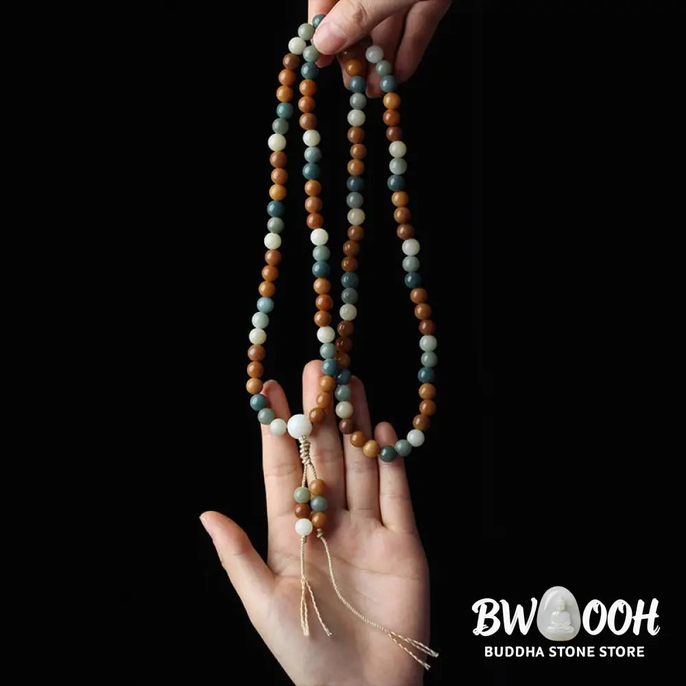 Close-up of BWOOOH Bodhi Seed Mala Harmony Wisdom Bracelet, featuring 8mm dark-speckled bodhi seed beads for meditation and spiritual awakening, handmade and ethically sourced, unisex design. - View 9