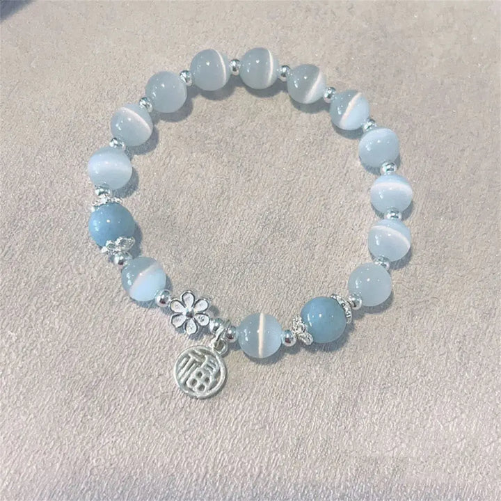 Buddha Stones Cat’s Eye Crystal Peach Blossom Bell Fu Character Charm Support Bracelet - BWOOOH - Cat’s Eye&amp;Blue