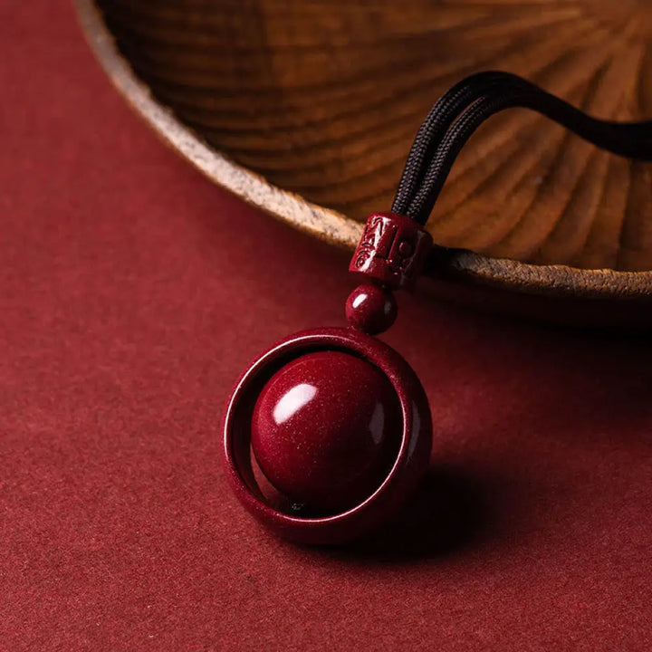 BWOOOH Cinnabar Om Mani Padme Hum PiXiu Blessing Necklace. Detailed 14mm cinnabar bead with etched mantra and PiXiu talisman, 50cm cord, for spiritual protection and prosperity. - View 20