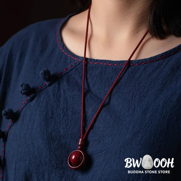 BWOOOH Cinnabar Om Mani Padme Hum PiXiu Blessing Necklace. Detailed 14mm cinnabar bead with etched mantra and PiXiu talisman, 50cm cord, for spiritual protection and prosperity. - View 8