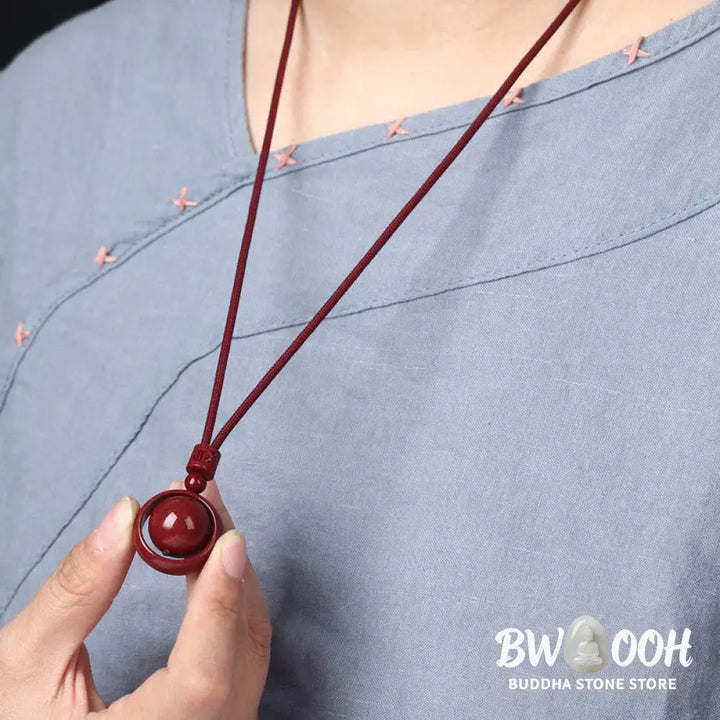BWOOOH Cinnabar Om Mani Padme Hum PiXiu Blessing Necklace. Detailed 14mm cinnabar bead with etched mantra and PiXiu talisman, 50cm cord, for spiritual protection and prosperity. - View 12