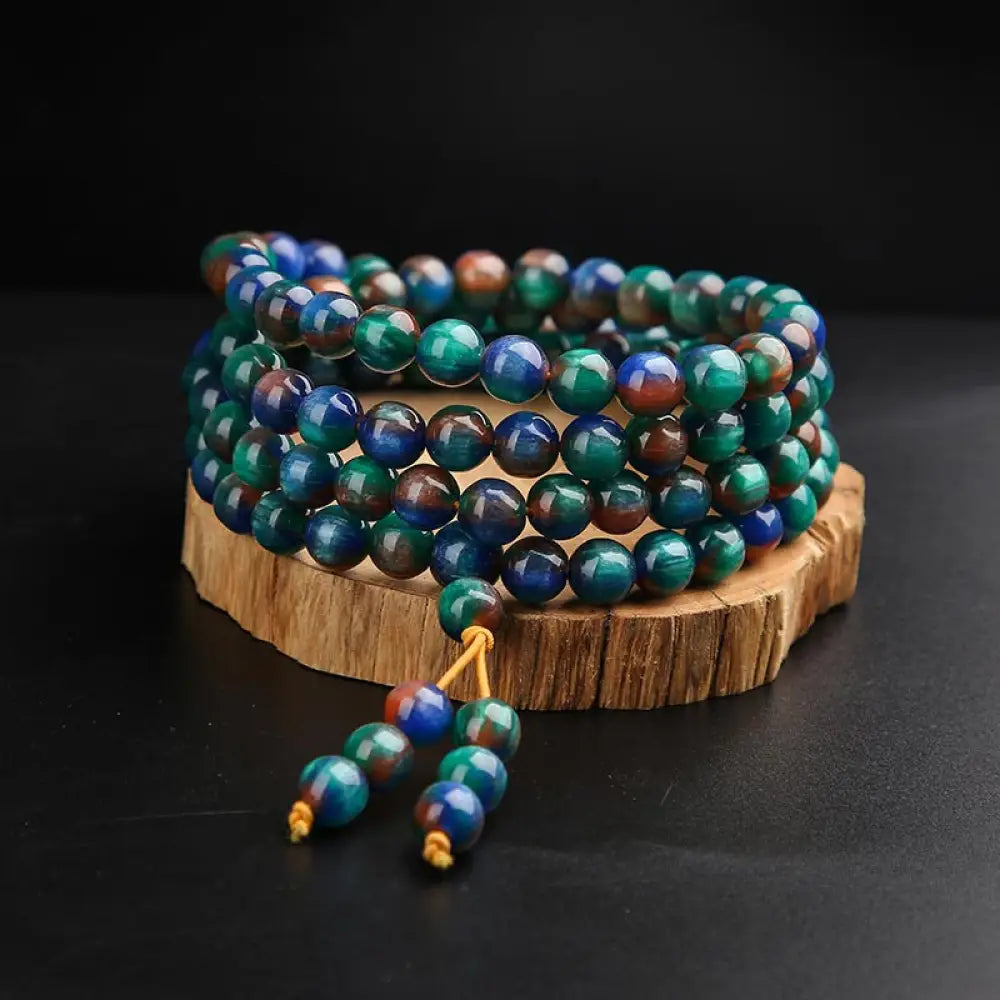 BWOOOH Colorful Sea Willow Mala bracelet ring, crafted from imitation black coral, featuring 108 beads (8mm) for meditation, symbolizing success, prosperity, and emotional healing. A high-end spiritual accessory.