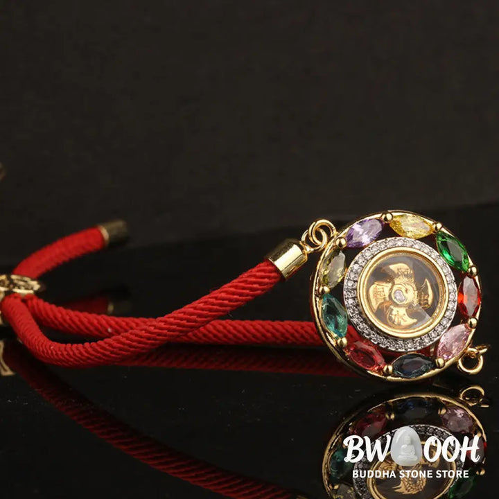 BWOOOH Colorful Zircon Copper Wealth Luck Rotation Bracelet Necklace Pendant, showcasing a luminous zircon centerpiece encircled by copper, adjustable red string, ready for spiritual balance and positive energy. - View 14