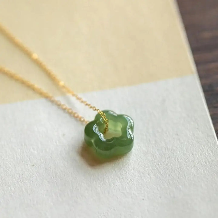 BWOOOH Dainty Hetian Cyan Jade Luck Floral Charm Necklace Pendant with 925 Sterling Silver chain, showcasing a delicate jade floral design for prosperity and spiritual balance. - View 11