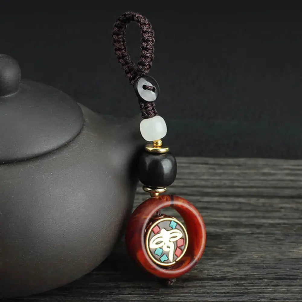 Buddha Stones Ebony Wood Sanskrit Four-leaf Clover Buddha’s Eye Peace Rotatable Key Chain - Buddha’s Eye Pattern - Key