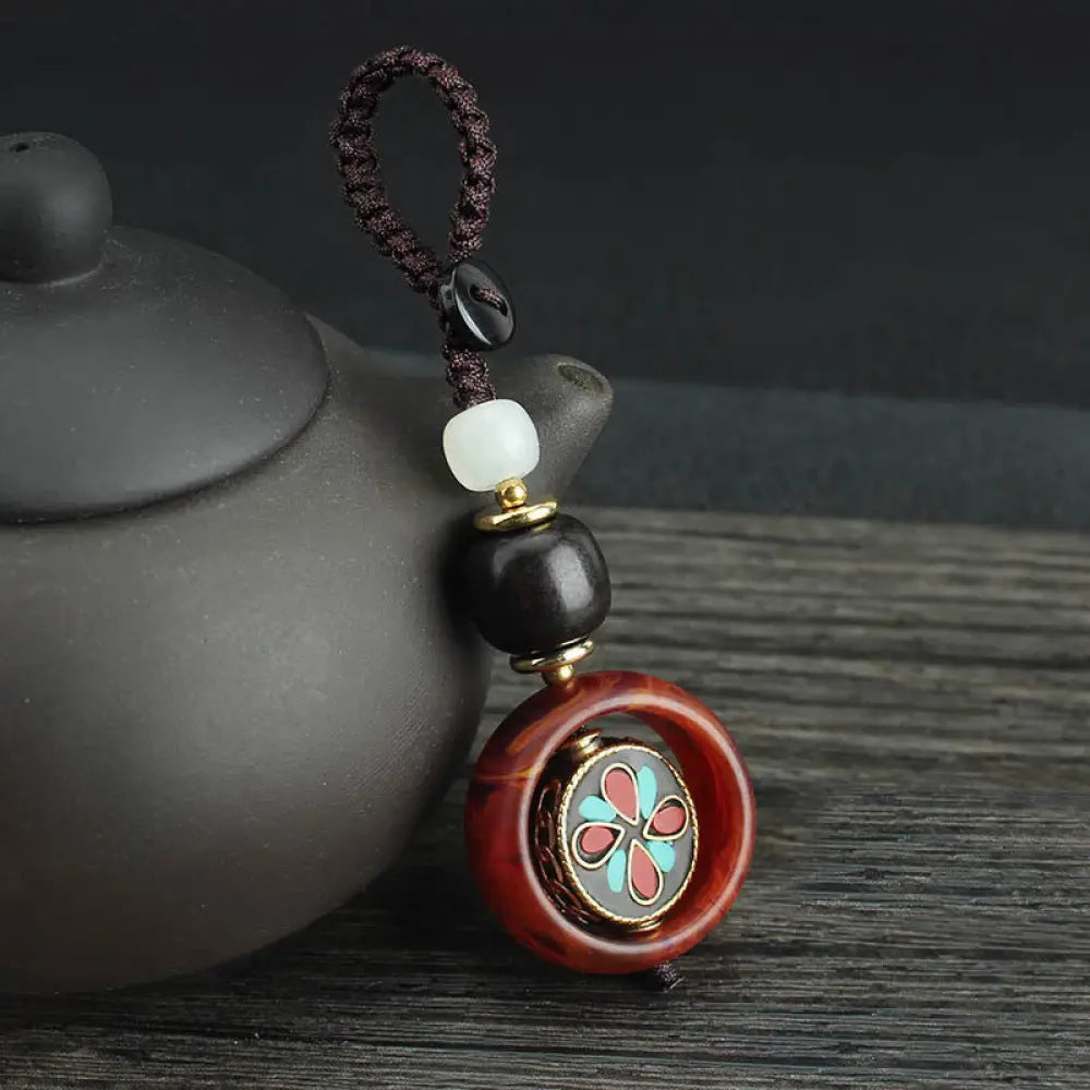 Buddha Stones Ebony Wood Sanskrit Four-leaf Clover Buddha’s Eye Peace Rotatable Key Chain - Four-leaf Clover Pattern