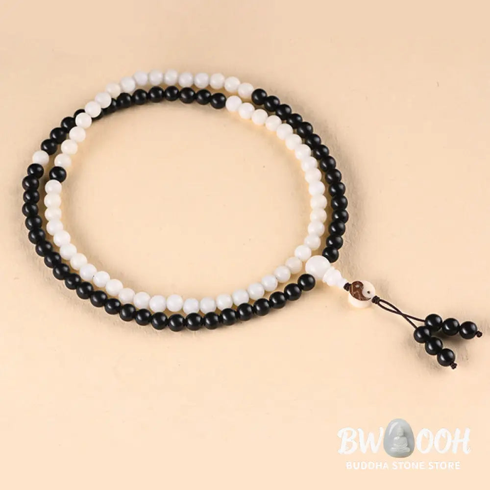 BWOOOH Ebony YinYang Protection Necklace Mala featuring 8mm Ebony and Bodhi Seed beads, designed for spiritual balance, protection, and focused meditation. - View 8