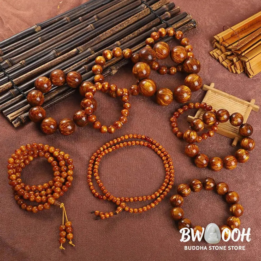 BWOOOH Golden Sea Willow Success Positive Bracelet Mala, handcrafted from synthetic Golden Sea Willow. Features rich golden hues, polished beads (various sizes like 15mm, 18mm, 108-bead configurations), and an elastic string, worn for mindfulness, prosperity, and spiritual balance. - View 2