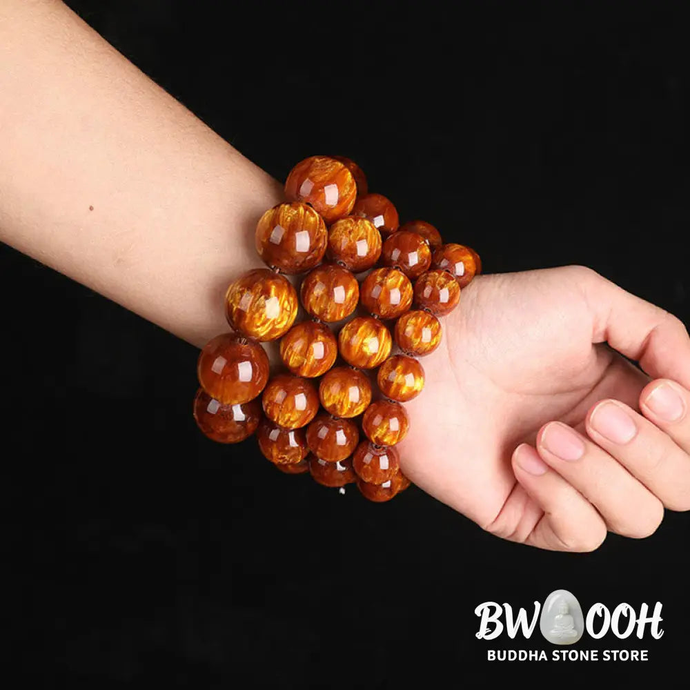 BWOOOH Golden Sea Willow Success Positive Bracelet Mala, handcrafted from synthetic Golden Sea Willow. Features rich golden hues, polished beads (various sizes like 15mm, 18mm, 108-bead configurations), and an elastic string, worn for mindfulness, prosperity, and spiritual balance. - View 13