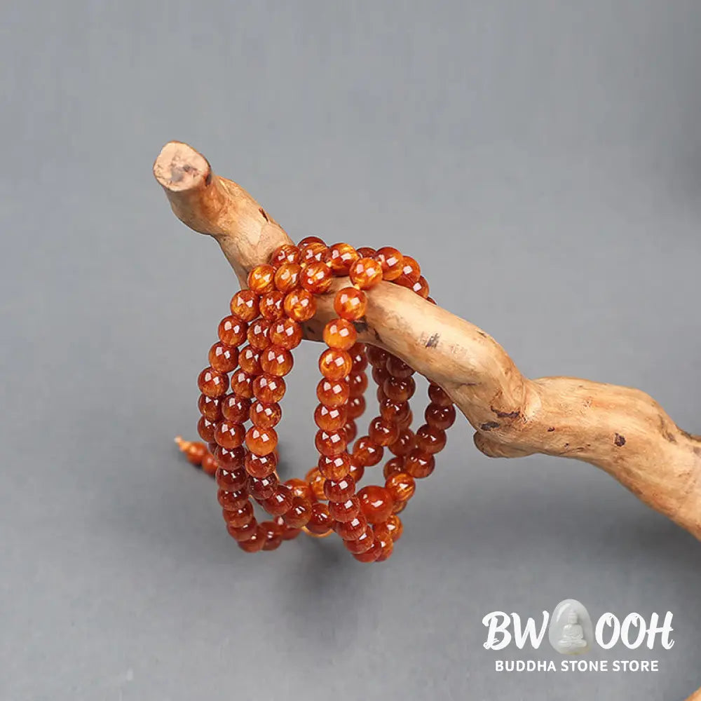 BWOOOH Golden Sea Willow Success Positive Bracelet Mala, handcrafted from synthetic Golden Sea Willow. Features rich golden hues, polished beads (various sizes like 15mm, 18mm, 108-bead configurations), and an elastic string, worn for mindfulness, prosperity, and spiritual balance. - View 15