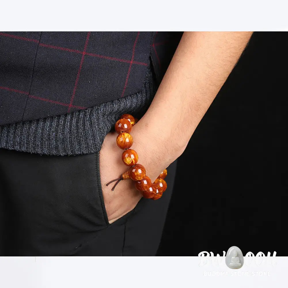 BWOOOH Golden Sea Willow Success Positive Bracelet Mala, handcrafted from synthetic Golden Sea Willow. Features rich golden hues, polished beads (various sizes like 15mm, 18mm, 108-bead configurations), and an elastic string, worn for mindfulness, prosperity, and spiritual balance. - View 7