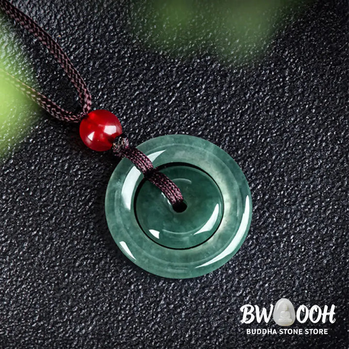 BWOOOH handcrafted Green Jade Double Peace Buckle abundance necklace pendant, featuring two polished circular jade discs with a rope chain, symbolizing harmony, prosperity, and inner peace. - View 3