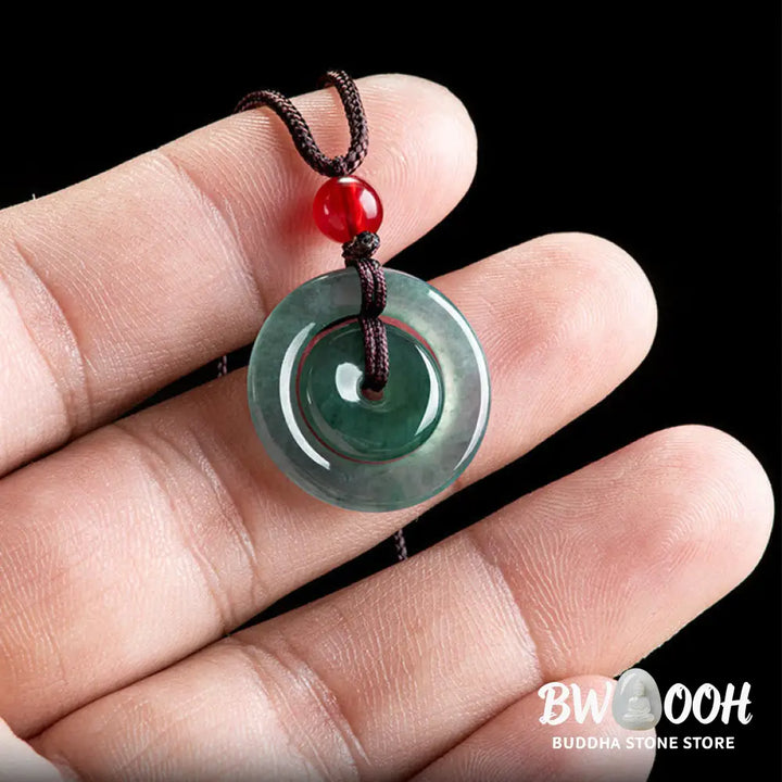 BWOOOH handcrafted Green Jade Double Peace Buckle abundance necklace pendant, featuring two polished circular jade discs with a rope chain, symbolizing harmony, prosperity, and inner peace. - View 5
