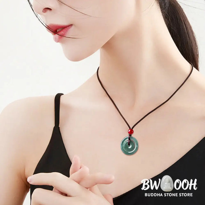 BWOOOH handcrafted Green Jade Double Peace Buckle abundance necklace pendant, featuring two polished circular jade discs with a rope chain, symbolizing harmony, prosperity, and inner peace. - View 10