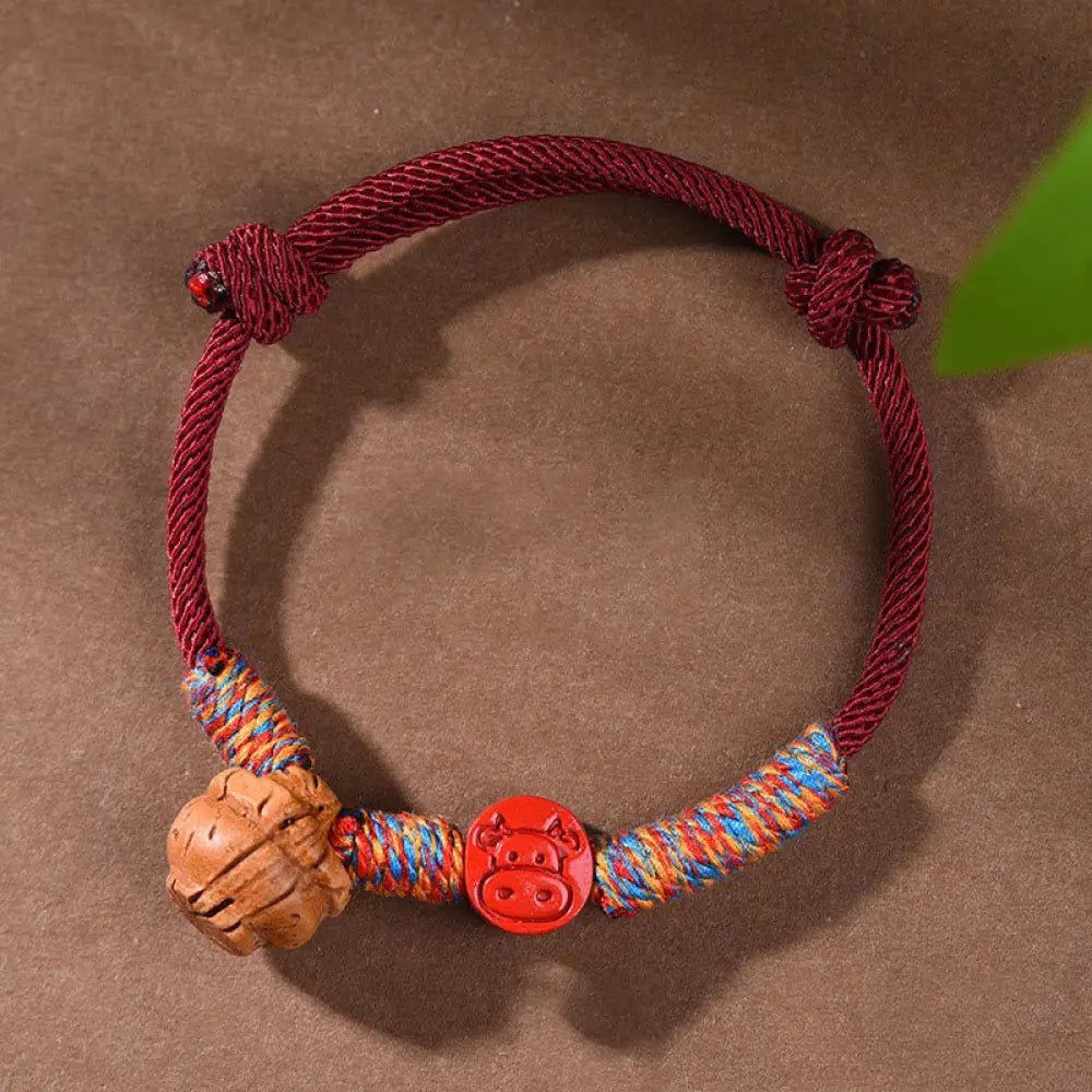 Buddha Stones Handmade Chinese Zodiac Red String Peach Pit Cinnabar Luck Bracelet - BWOOOH - Ox / Red Rope(Wrist