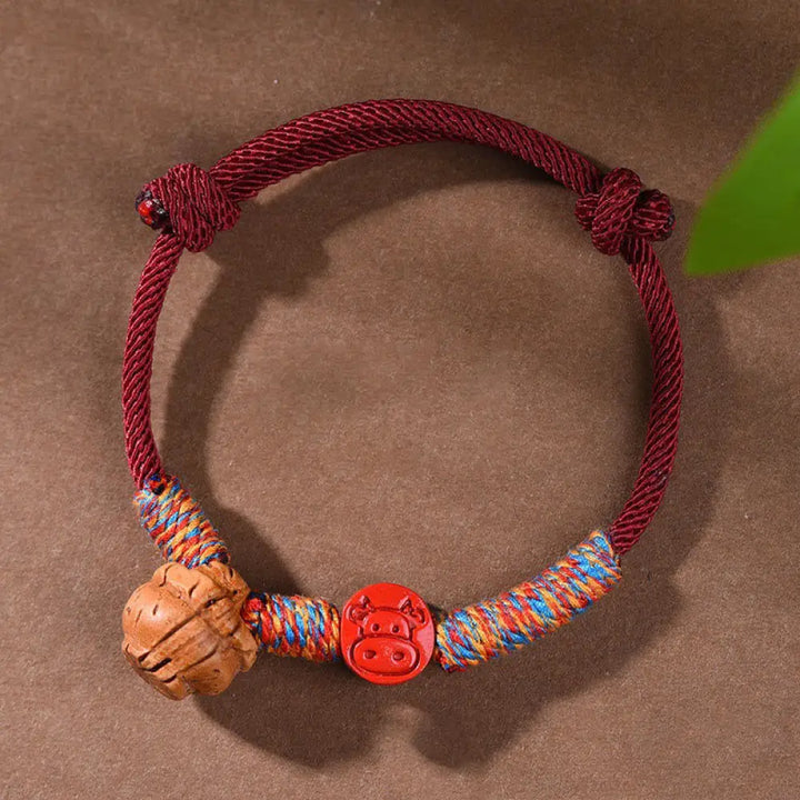 Buddha Stones Handmade Chinese Zodiac Red String Peach Pit Cinnabar Luck Bracelet - BWOOOH - Ox / Red Rope(Wrist