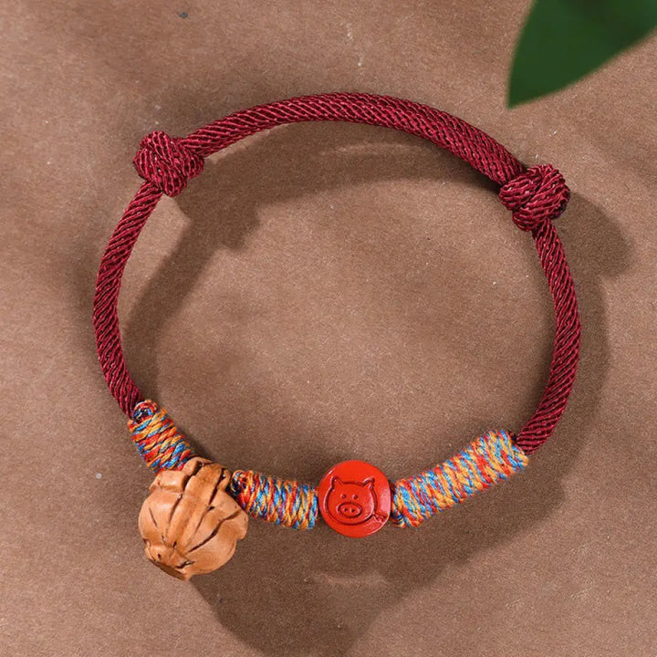 Buddha Stones Handmade Chinese Zodiac Red String Peach Pit Cinnabar Luck Bracelet - BWOOOH - Pig / Red Rope(Wrist