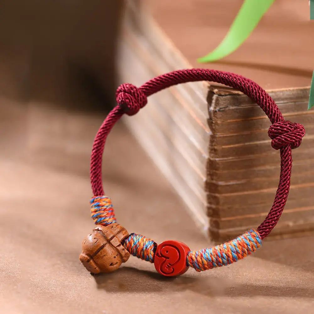 BWOOOH Handmade Chinese Zodiac Red String Peach Pit Cinnabar Luck Bracelet — String Tibetan bracelet for spiritual healing...