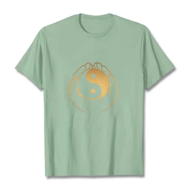 Buddha Stones Hands Holding A Golden Yin Yang Tee T-shirt - PaleGreen / S - T-Shirts