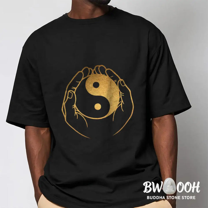 Buddha Stones Hands Holding A Golden Yin Yang Tee T-shirt - T-Shirts