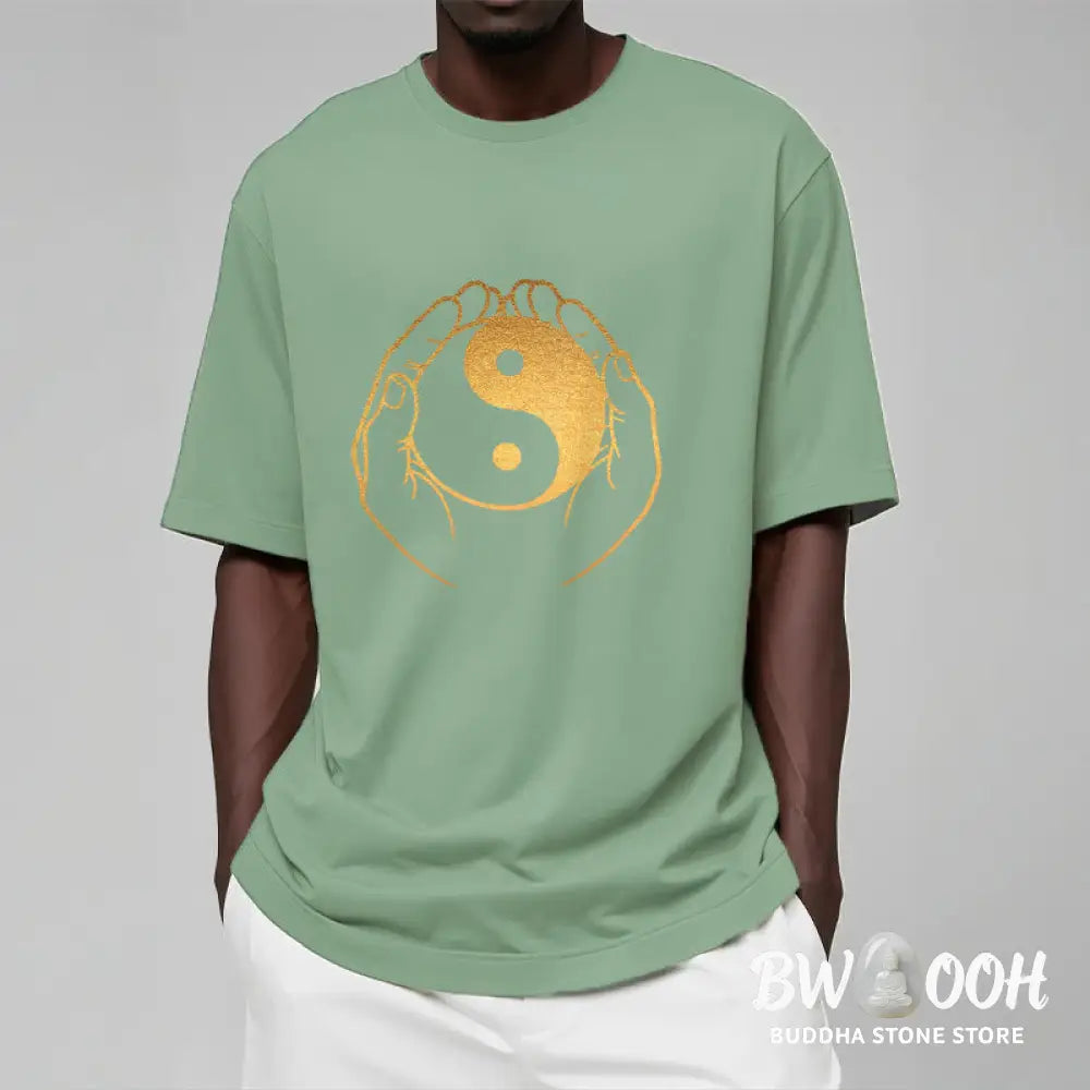 Buddha Stones Hands Holding A Golden Yin Yang Tee T-shirt - T-Shirts