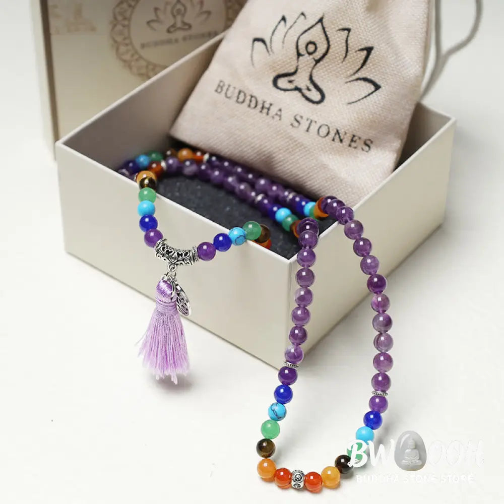A BWOOOH 108-bead mala featuring 6mm polished Amethyst, lustrous Tiger Eye, and grounding Volcanic stones, styled as a multilayer bracelet and necklace for meditation and 7 Chakra healing. - View 7