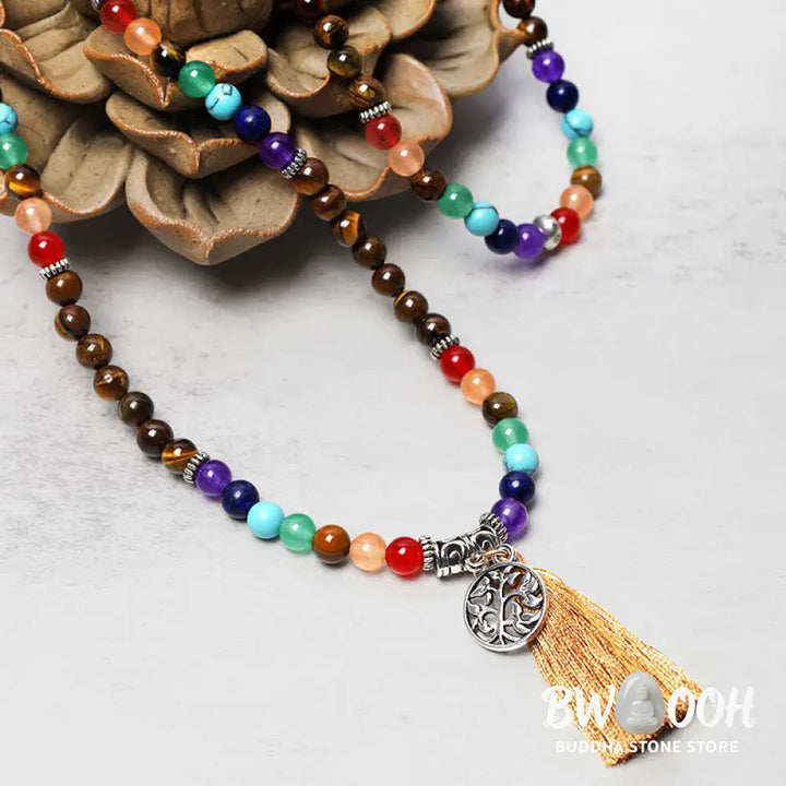 A BWOOOH 108-bead mala featuring 6mm polished Amethyst, lustrous Tiger Eye, and grounding Volcanic stones, styled as a multilayer bracelet and necklace for meditation and 7 Chakra healing. - View 10