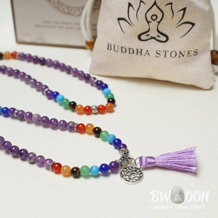 A BWOOOH 108-bead mala featuring 6mm polished Amethyst, lustrous Tiger Eye, and grounding Volcanic stones, styled as a multilayer bracelet and necklace for meditation and 7 Chakra healing. - View 6